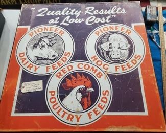 Pioneer Red Comb feeds sign.  It is made of metal, is not porcelain. 