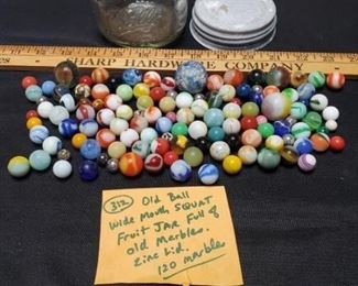 120 marbles. There are Benningtons, peltiers, corkscrews, German, steelies, cobalt blue, jadite, more. 