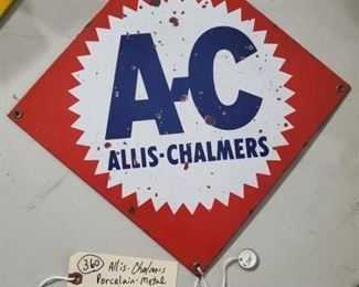 Allis-Chalmers tractor / farm equipment company advertising sign. heavy porcelain over metal. Has a lot of pockmarks, possibly shot with BBs at one point in its life. 