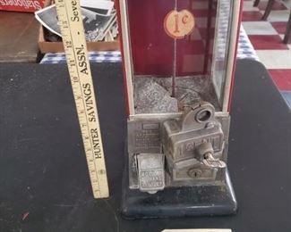 1923 MASTER 1 cent gumball / candy machine.  Has the key that fits both the top and the money bin.  We tested it with a penny and it turned and worked. 