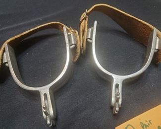 Old cowboy boot western rodeo spurs. The leather looks to be in good shape and both spurs are marked CROCKETT. 