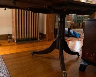 Early 19th Century Antique English Banquet Dining Table with Brass Claw Feet. Purchased from Richard Norton Antiques. Tables Measures 164" L x 41.5" D x 29.5" H. With Two Pedestals, Table Measures 69" W x 41.5" D x 29.5" H. There are Three Leaves - 30" W, 28" W & 36" W to create myriad seating arrangements. Photo 4 of 4.