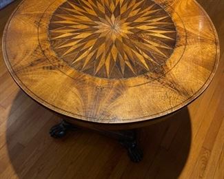A Scandinavian Marquetry Circular Center Table with Claw Feet. Circa 1820. Measures 35" D x 28" H. Photo 2 of 5.
