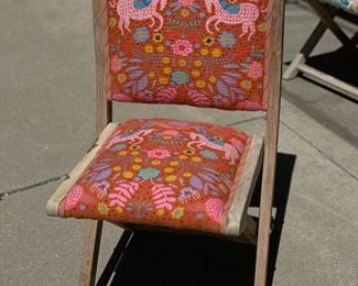 Anthropologie Jimena Terai Folding Chairs in Unicorn - 2 available. Each measures 32" H x 16" W x 16" D with 19.5" Seat Height. Photo 1 of 5.