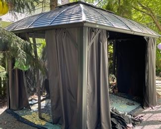 Domi Outdoor Living Hardtop Gazebo. Measures 8' x 10'. Photo 1 of 4.