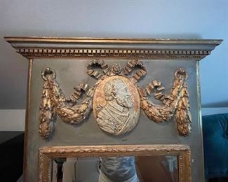 18th Century Swedish Painted and Parcel-Gilt Pier Mirror. Beveled Mirror rests below the crest, decorated with a bas-relief classical profile portrait of a Gentleman. Measures 73" H x 32.25" W. Photo 2 of 4.