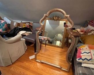 Gilt Sculptural Wood Mirror. Measures 31" W x 50" H.