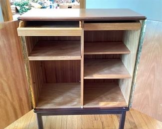 Swedish Art Deco/Neoclassical Inlaid Storage Cabinet by Mjolby Intarsia. Woods include Satinwood, Carpathian Elm, Golden Flame Birch and Mahogany. Interior has adjustable shelves. Measures 48" H x 17" D x 35" W. Photo 3 of 4.