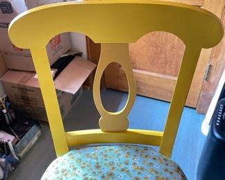 Yellow Upholstered Desk Chair with Pom Pom Trim. Photo 2 of 4.