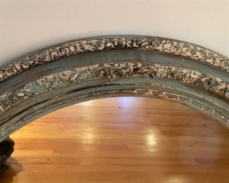 Large Blue Gesso Oval Mirror with Foliage Trim in an Antiqued Finish - 2 available. Circa 1970s. Measures 32" H x 27" W. Photo 2 of 2.
