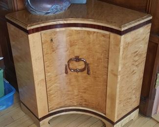 One of Two Vintage Swedish Neo-Classical Corner Cabinets in Flame Birch and Rosewood. Each Measures 32.25" W x 33" H.