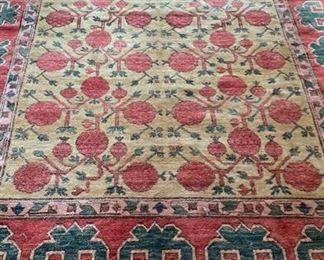 Vintage Khotan Rug. Measures 6.75" x 9.75." Photo 1 of 4.