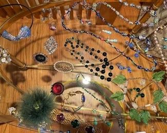 Sample of Costume Jewelry including Mariam Haskell pieces.