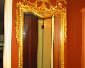 Gilt neoclassical  beveled wall mirror