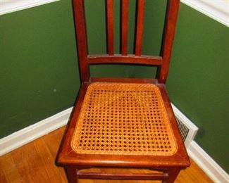 Antique chair with caned seat