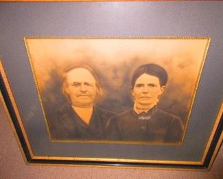 Victorian crayon portrait of man and wife