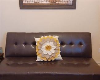 Leather like futon, sofa. 