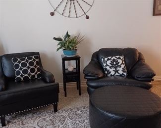 2 full leather side chairs with ottomans.  Soft and cozy.