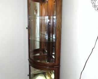 corner lighted curio cabinet