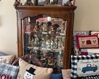 . . . a beautiful curio filled with Hummels!