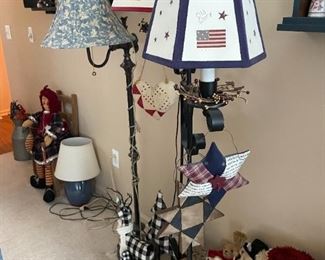 . . . three similar standing lamps