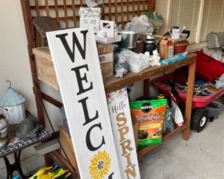 . . . Welcome sign and garden bench