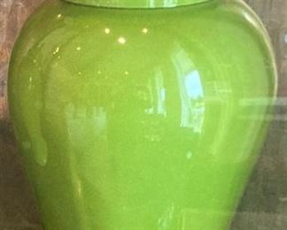 One of two large lime colored ginger jars
