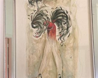 One of three mirrored framed show girl pictures