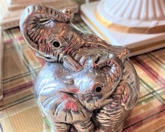 Silver-toned elephants