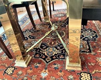 Brass base of the glass top table
