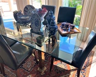 Brass base/glass top dining table