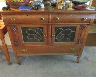 Antique tiger oak cabinet with leaded glass