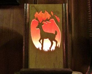 Rustic lamp with changeable cut-outs