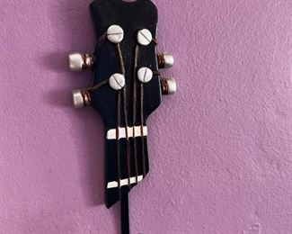 Staging décor Guitar Key Hook, placed for tour, but in Actual Jim's Room