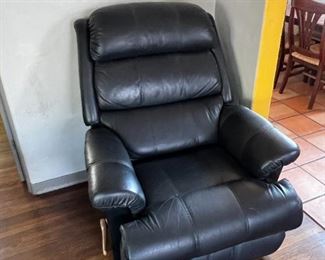 Leather arm chair for staging in Rob room