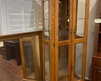 Display cabinet- missing two top pieces of glass. Bottom 2 panels are intact. 