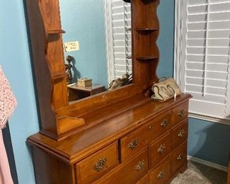 Nice dresser and mirrored topper. 