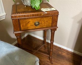 Love this little side table with burled wood details and bamboo style legs. 
