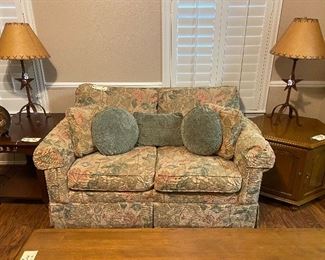 Nice little floral love seat. Comfy couch perfect for small spaces. 