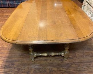 I love this coffee table. It is a drop leaf table - see the next picture. Perfect for dinner on the floor in front of the tv. Just need some floor cushions !! 