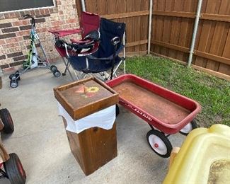 Folding chairs, red flyer wagon, potato bin