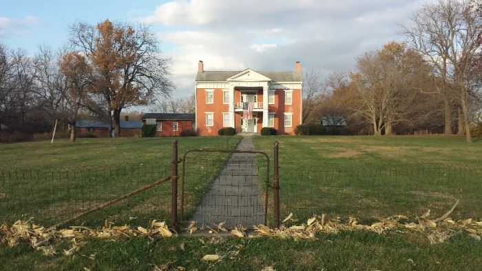 The family has lived in this home since 1825 and has rarely discarded a thing. Please walk up the driveway to visit the Garage (on left) and Summer kitchen, shown on far left.