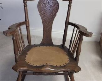 Antique Beautifully Carved Rocking Chair with Leather Seat