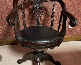 Gothic Leather and Wood Swivel Armchair with Nail Head Trim