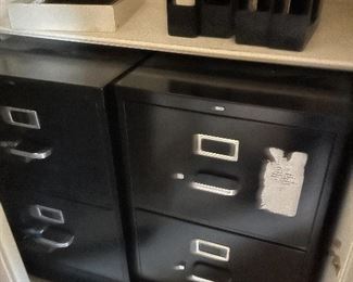 Several metal 2 drawer and 4 drawer file cabinets 