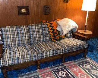 Plaid couch- currently unpictured is the matching chair! Aztec like rug, owl wall art 