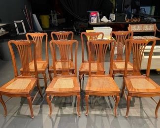 8 oak caned chairs