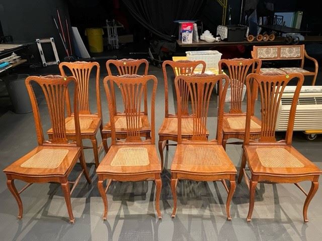8 oak caned chairs