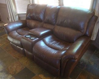 Leather sofa with reclining ends, electronic controls