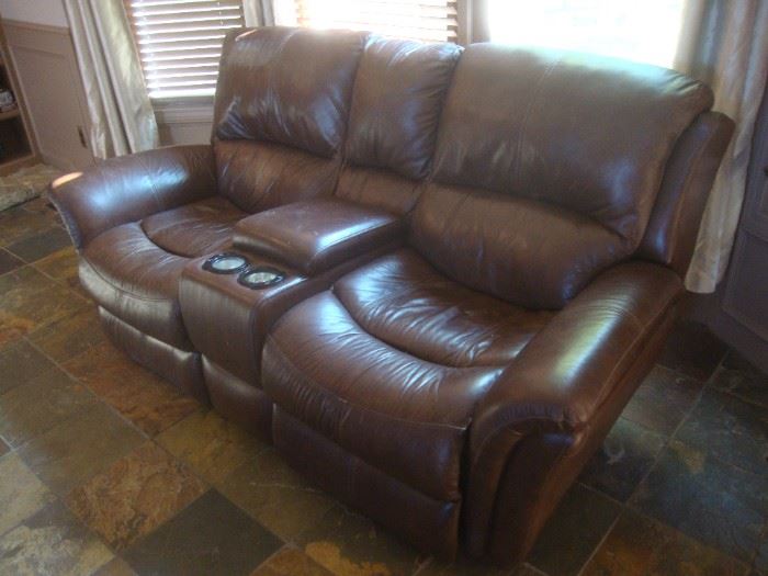 Leather sofa with reclining ends, electronic controls